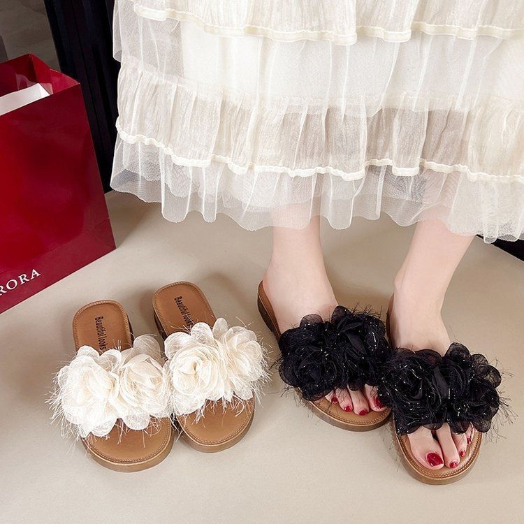 Versatile outer wear flower beach cool slippers women's 2025 summer new beautiful flat flat one-word shoes go out