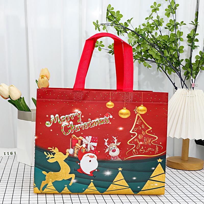 New Christmas Gift Bag Non-woven Santa Snowman Xmas Tree Tote Bags Candy Gift Packaging Bag Shopping Bag Xmas 2026 New Year Bags