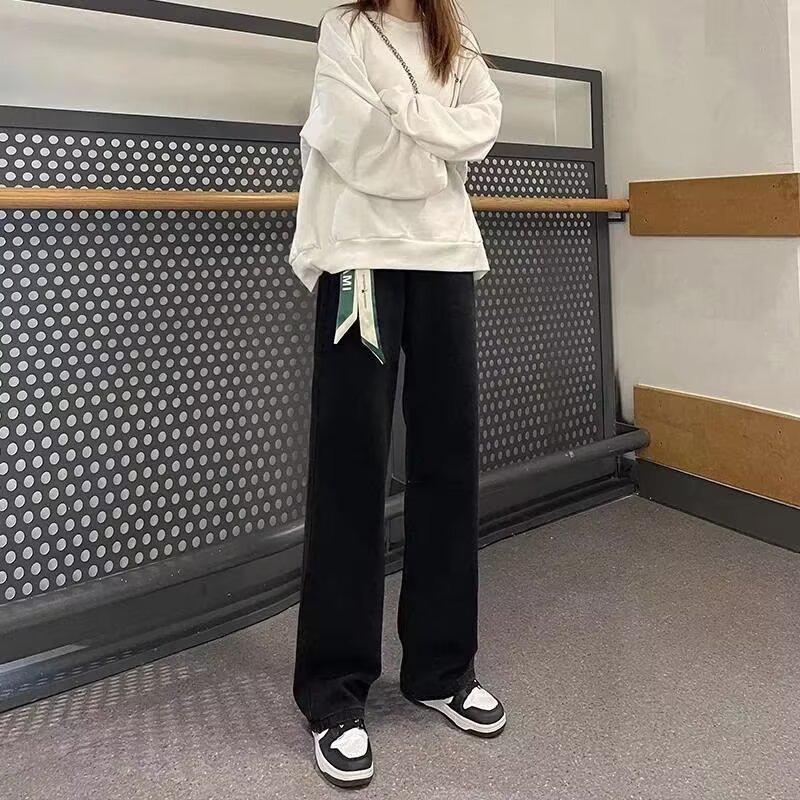 

Женские черные джинсы с высокой посадкой и широкими штанинами с деталью в виде шелкового шарфа - Коллекция весна/осень 2025 2XL чёрный