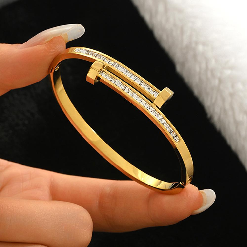 Edelstahl Damen Armband Schmuck mit Zirkonium & Titan Kleeblatt.