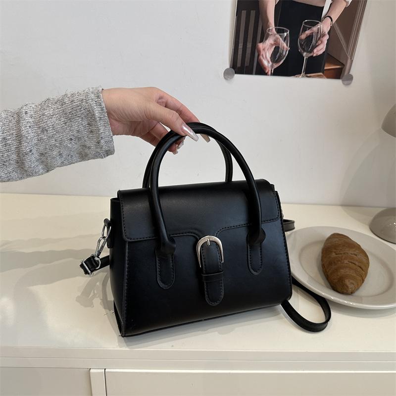 

Нишевый дизайнерский сенс новая однотонная сумка Kelly женская мода простой темперамент красивая зарубежная стильная универсальная сумка-мессенджер чёрный