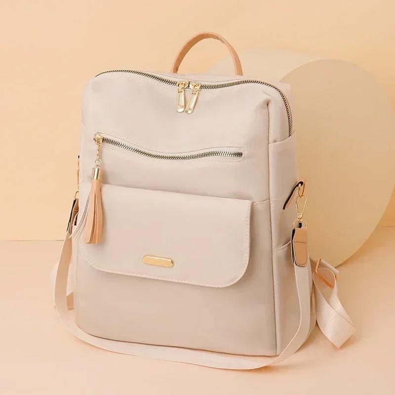 Nylonový zip Velkokapacitní Módní batoh Ležérní Všestranný Šicí nit Jednobarevný Střapec Design Vysoce kvalitní Měkká záda