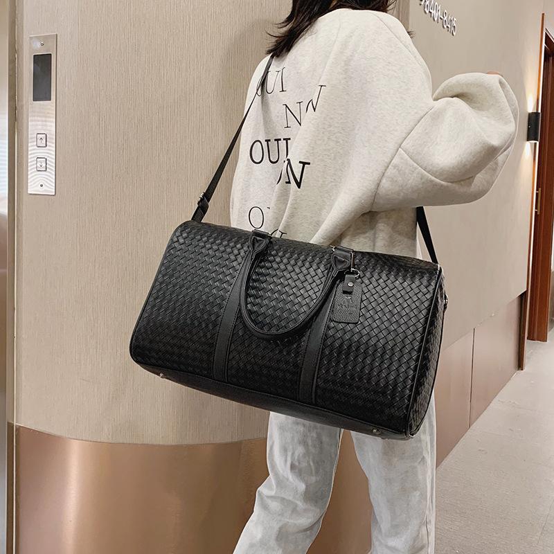Travel bag European and American fashion woven large-capacity pu fitness bag business trip boarding bag men's business storage accommodation bag