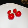 Silver needle New Year's red round pearl stud earrings retro fashion earrings women's niche design earrings light luxury high sense