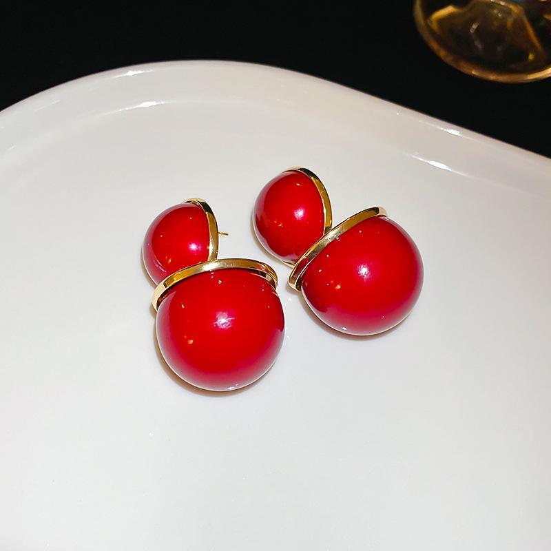 Silver needle New Year's red round pearl stud earrings retro fashion earrings women's niche design earrings light luxury high sense