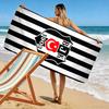 Zwart-wit gestreepte handdoek Een must-have strandhanddoek voor strandreizen