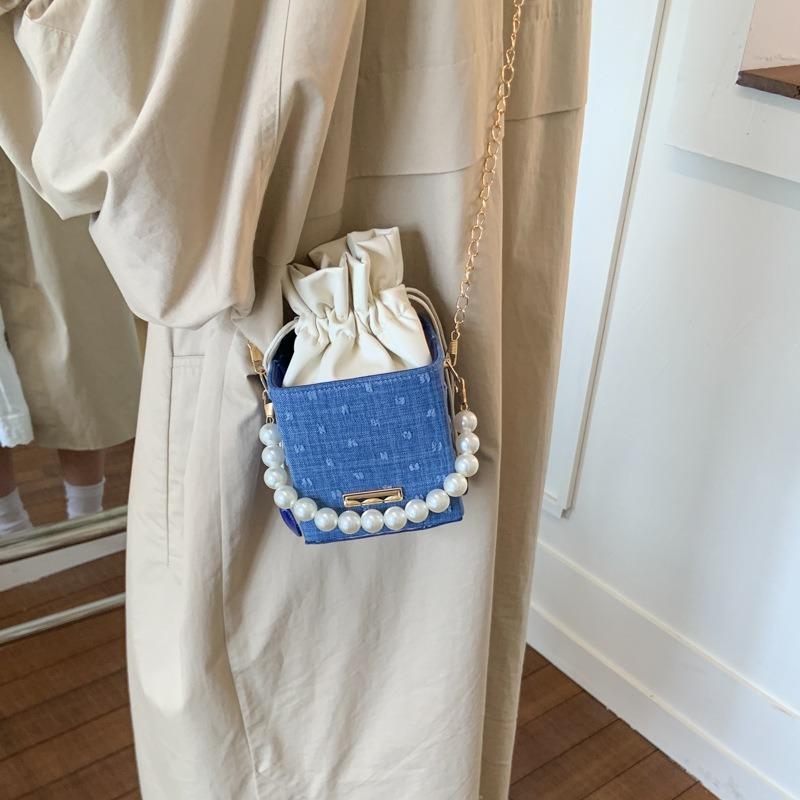New niche bucket bag trendy personalized high-end messenger bag simple atmosphere pearl portable women's bag