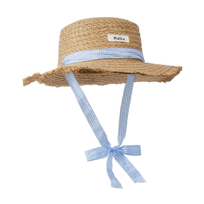 Idyllic straw hat summer seaside vacation sun protection sun hat children outdoor travel atmosphere sun hat