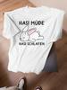 Black Graphic Tee Featuring a Sleepy Rabbit Design