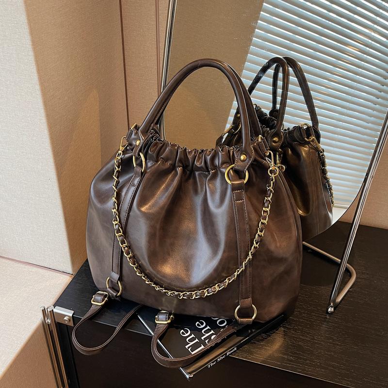 

Autumn and winter large-capacity bag women s new versatile messenger bag commuter shoulder tote bag backpack темно-коричневого