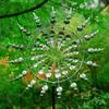 Kinetische Windmühlenskulpturen aus Metall, einzigartiger und magischer windbetriebener Spinnergarten