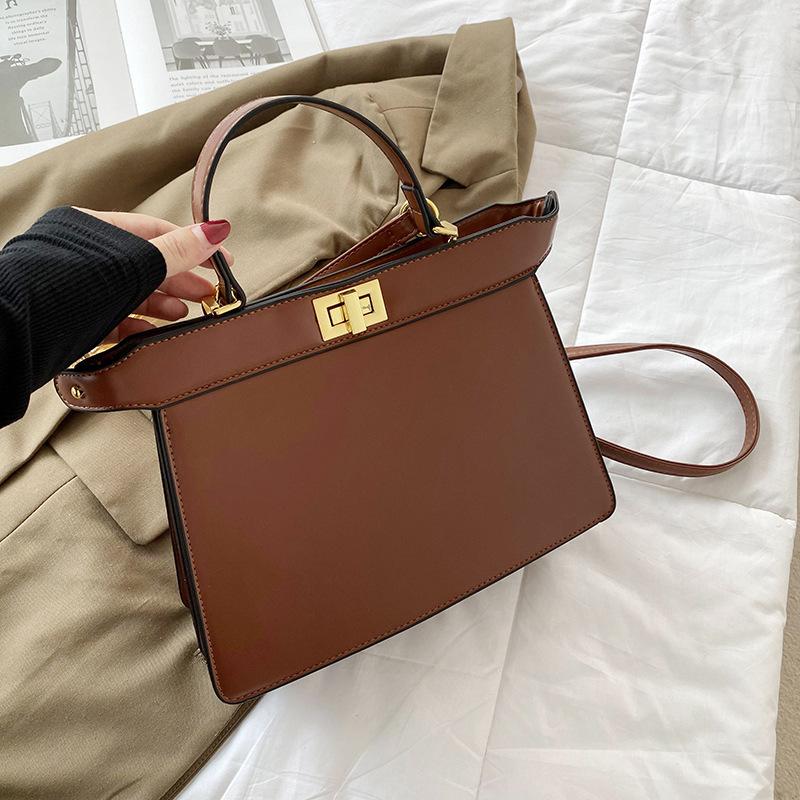 New High-end Solid Color Lock Kaibaoli Portable Shoulder Oblique Span Women's Bag