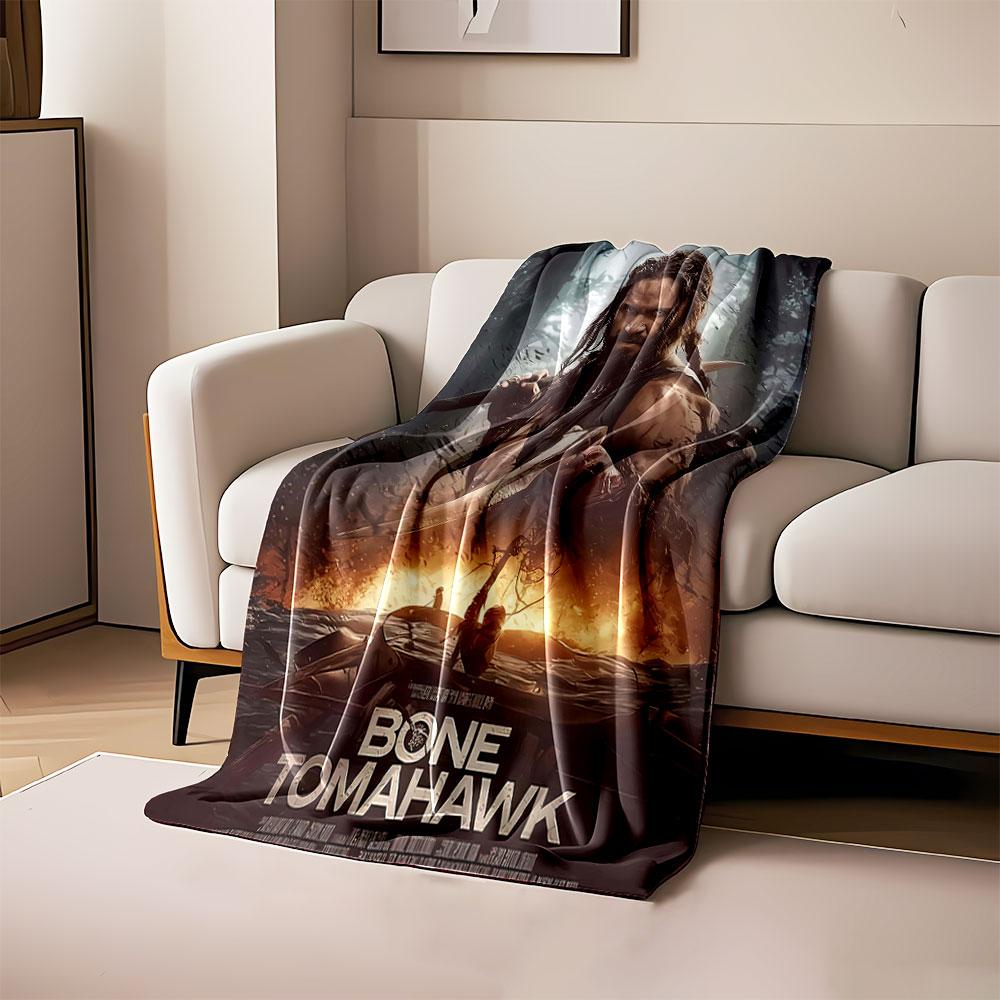 

A rugged figure holding weapons, with fiery and forested background. for all seasons blanket lunch break throw gift 80cm x 120cm