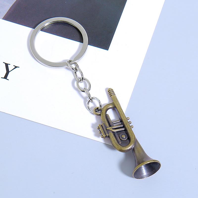 Mini nástroj Saxofon Přívěsek na klíče do auta Mini hudební nástroj Kovový kroužek na klíče Příslušenství Přívěsek na tašku Dárky na hudební festival