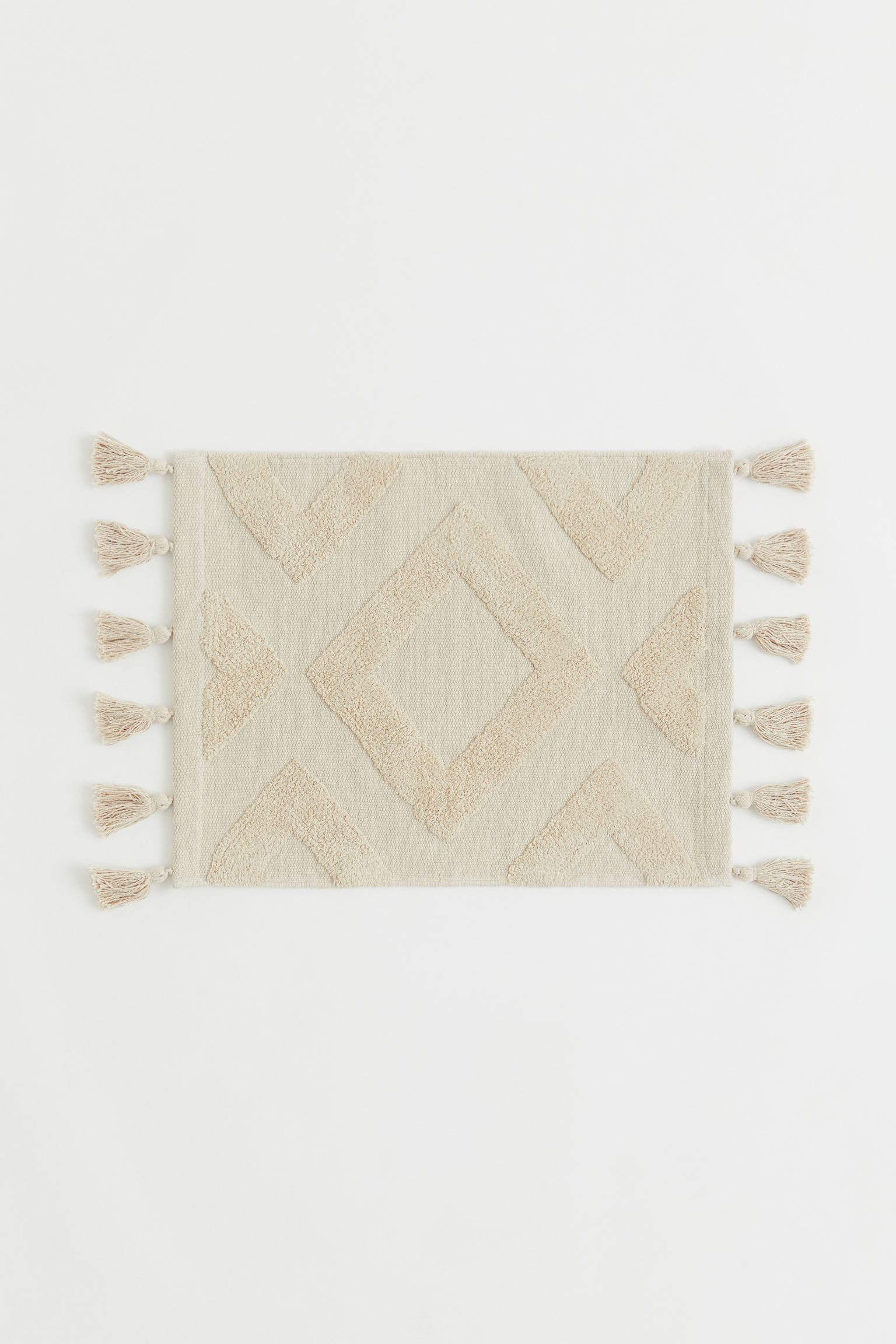 

Tasselled bath mat