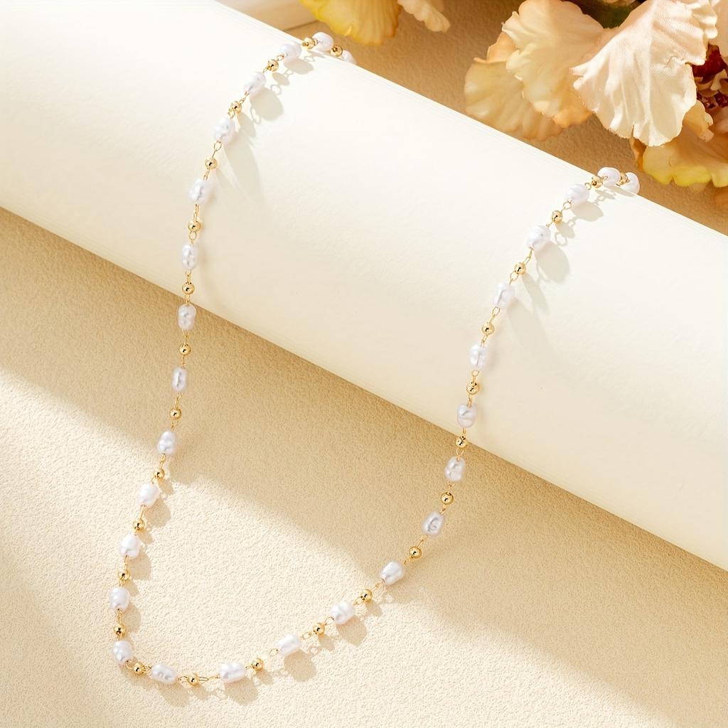 A High-end Rice-grain Shaped Pearl Chain Short Necklace, an Elegant and Stylish Clavicle Chain, Suitable for Women To Wear Every Day.