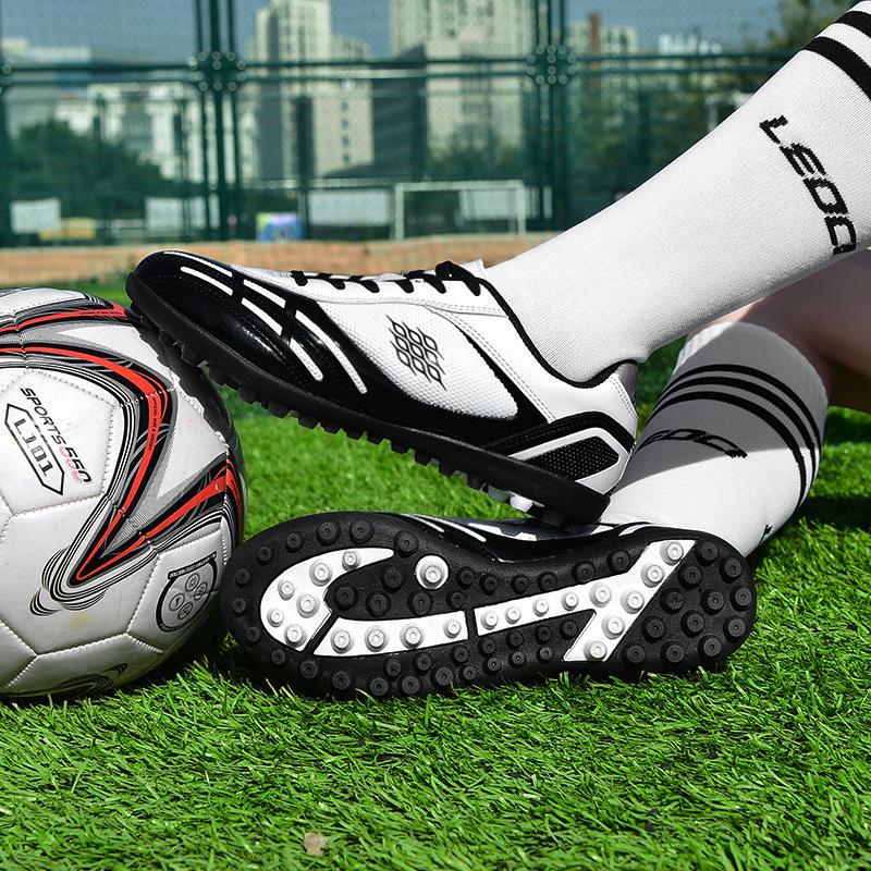 Children's leather feet women's nail shoes new youth football shoes male students broken training artificial turf price