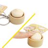 Niedlicher Schlüsselanhänger mit simuliertem gedämpftem Brötchen und Knopf-Dekompressionfunktion, Kreatives Geschenk