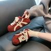 Retro Maillard color matching board shoes women's autumn new flat bottom inner height increase leisure sports
