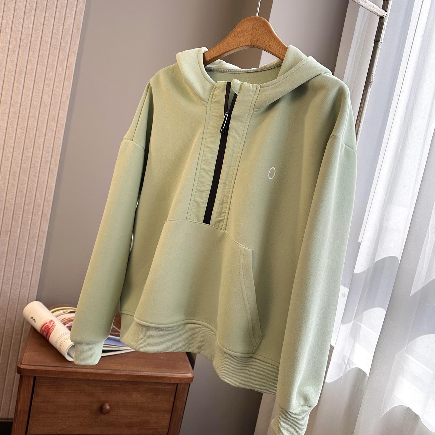 

Жіночий весняно-осінній худі з капюшоном на половину блискавки - пуловер у корейському стилі Medium світло-зелений колір