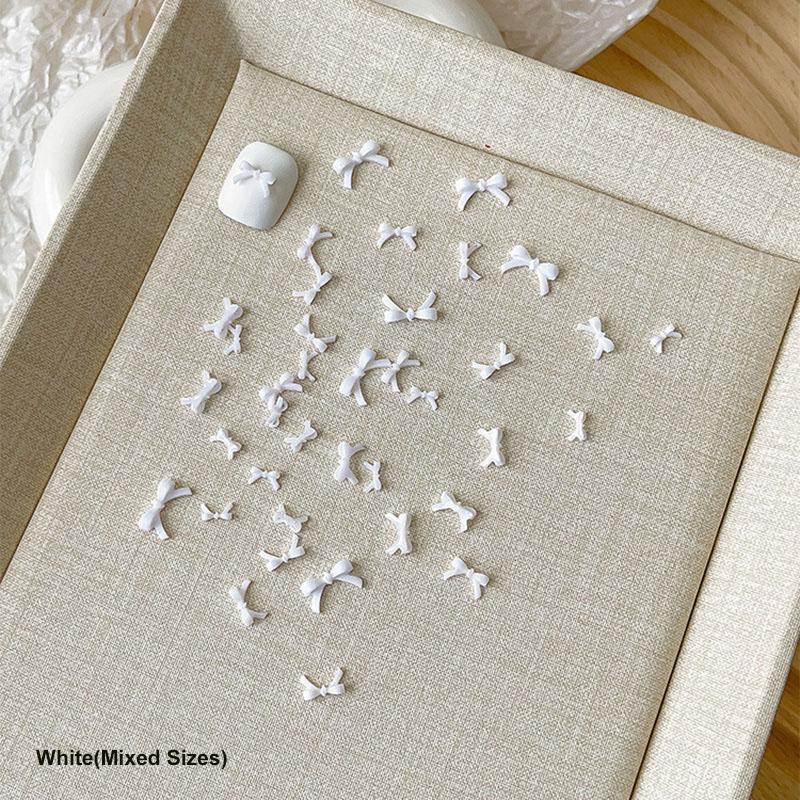 50Pcs Colorful Bow Nail Art Parts Charms Bulk Shiny Mini Resin Ribbon Nail Rhinestones Diy Summer Nail Art Decor Accessories