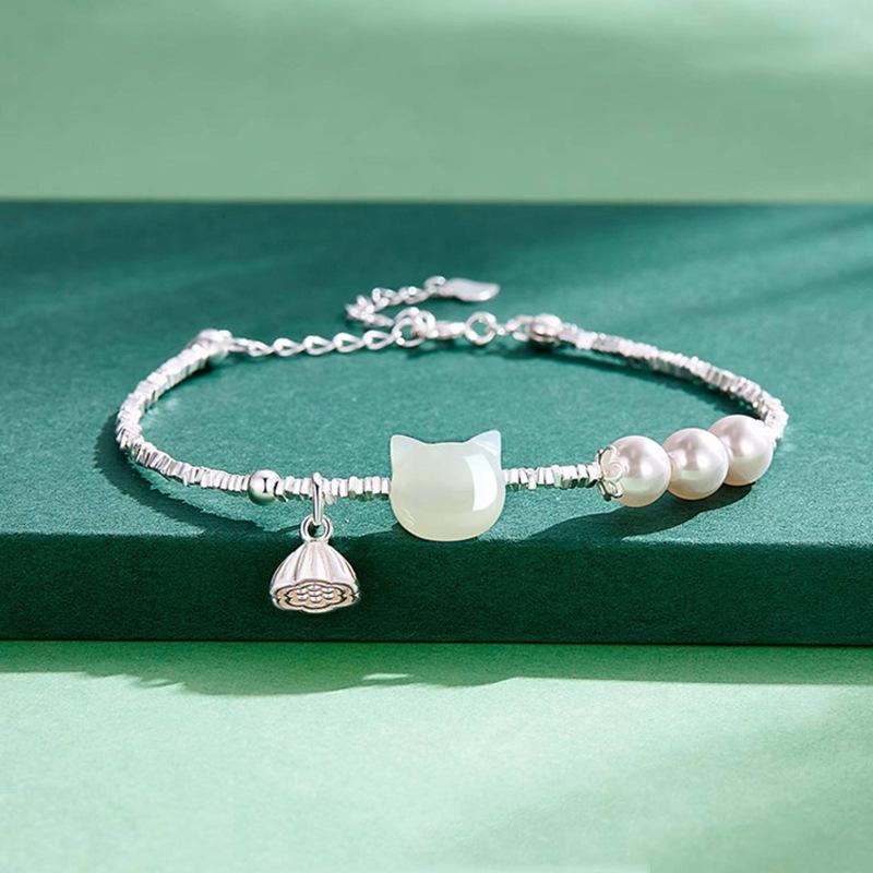 Hetian Jade Lotus Bracelet for Women - Elegant 2026 Trendy Cat Design, Ideal Gift for a Fashionable Girlfriend.