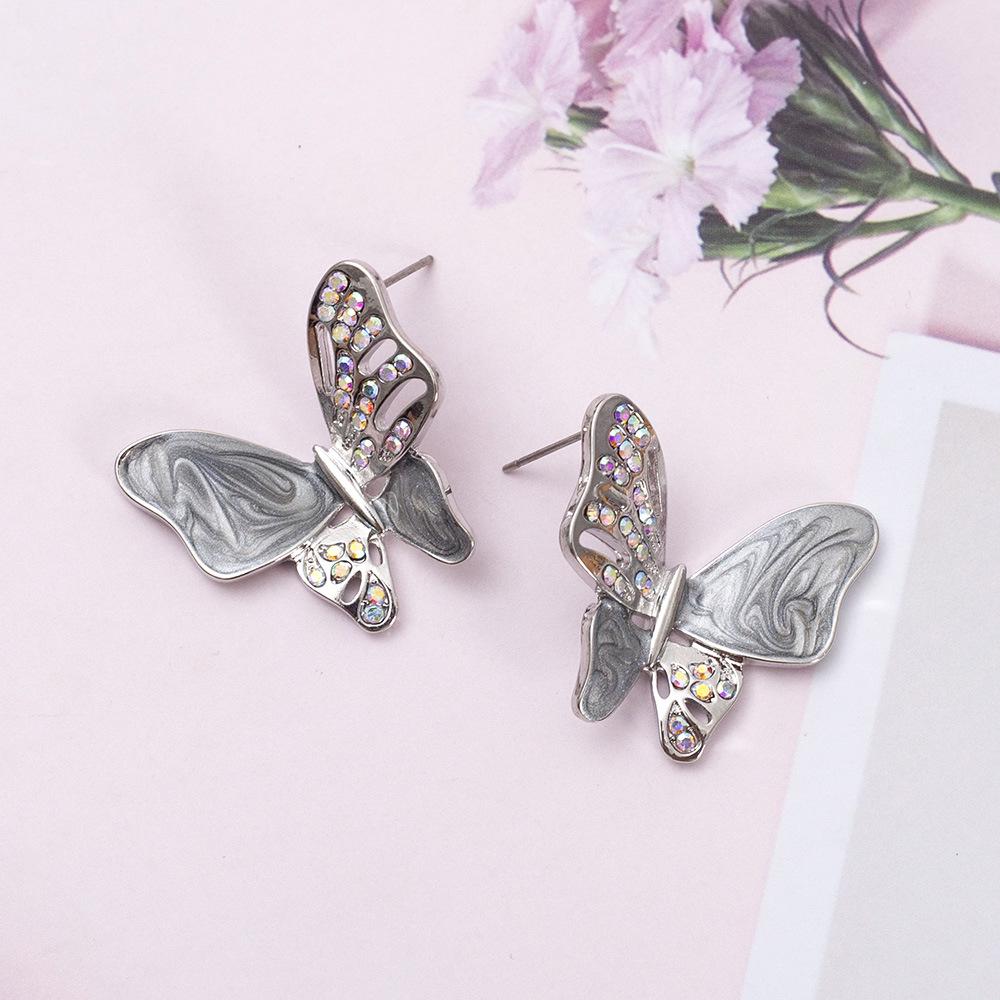 

Retro Korean Fashion Butterfly Stud Earrings with Inlaid Diamonds серебряный