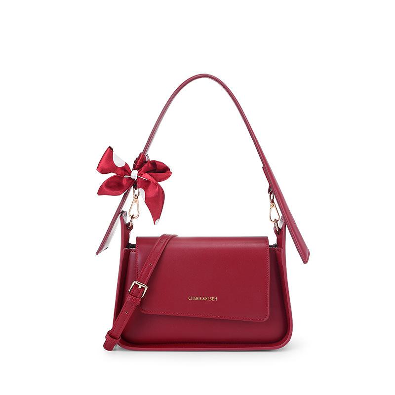 The Red Bag Is A Women's Underarm Bag and A Bride's Wedding Bag. It Can Be Used Daily As A Crossbody Handbag