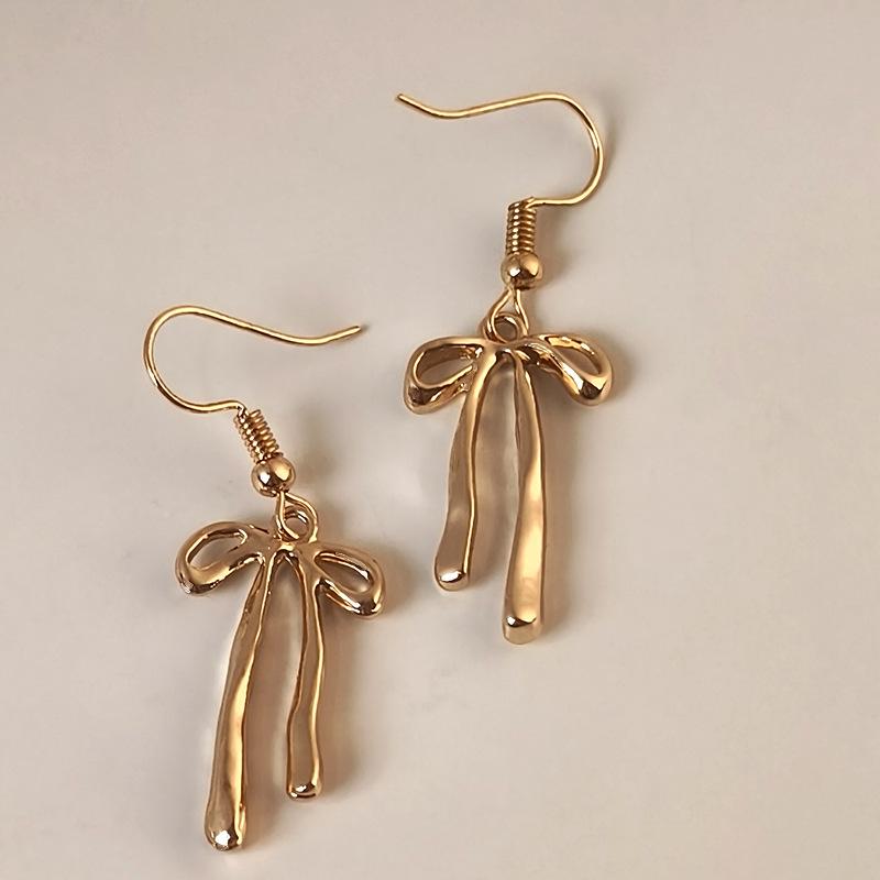 New Bow-Knot Fringe Earrings Elegant gold-tone earrings with a sophisticated aesthetic Ladies' earrings