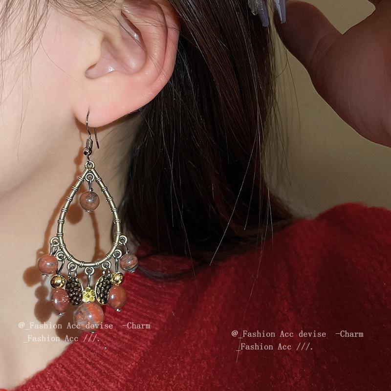 Water drop tassel earrings New Chinese retro temperament High-end ear hook Niche fashion design earrings Women