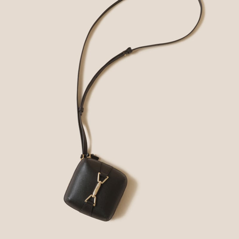 

Manon Cross Charm 10 (brown)_RCBDX24643BRD Ground coffee