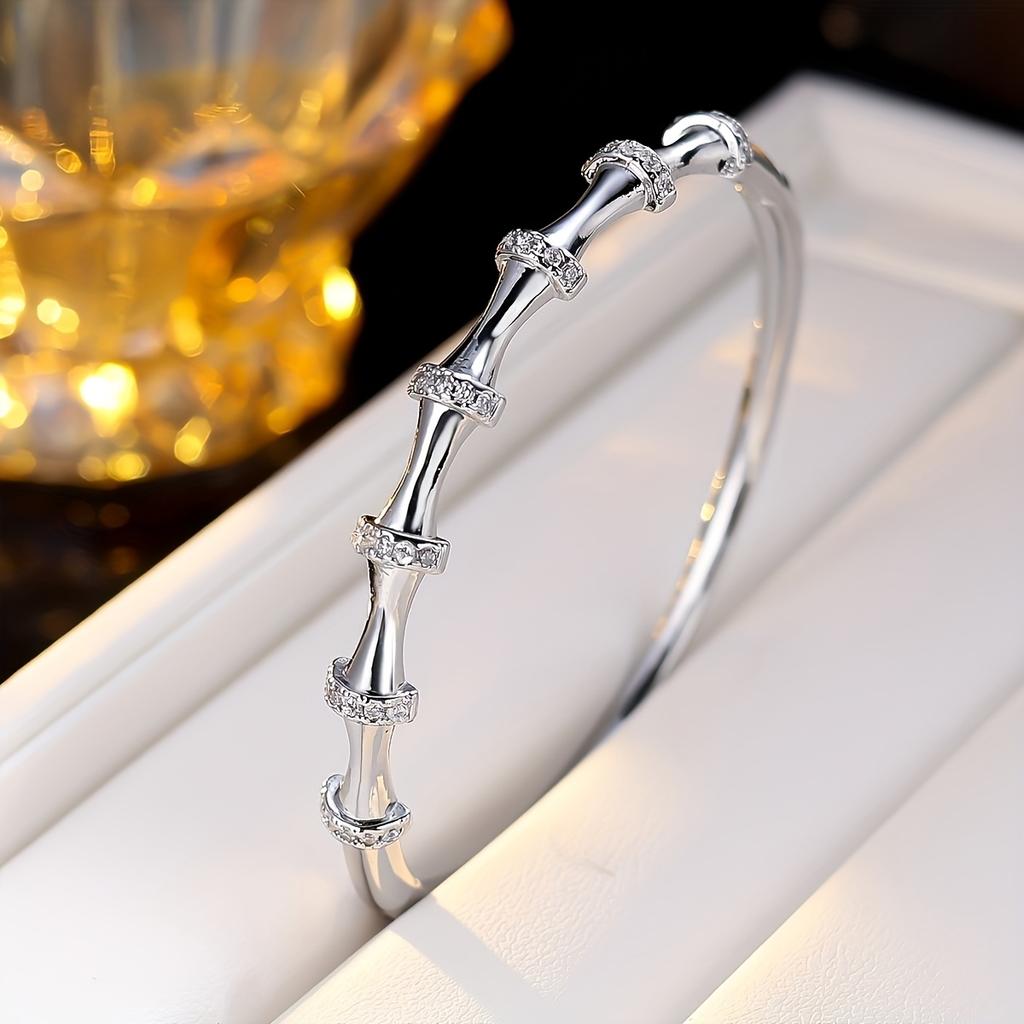 1Elegant women's bamboo bracelet inlaid with sparkling artificial zirconia Simple/The bamboo design is suitable for daily wear and can be used as a