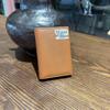 Premium Leather Card Holder: Unisex Cowhide Business Case with Mirror Window, Snap Closure & Coin Purse.