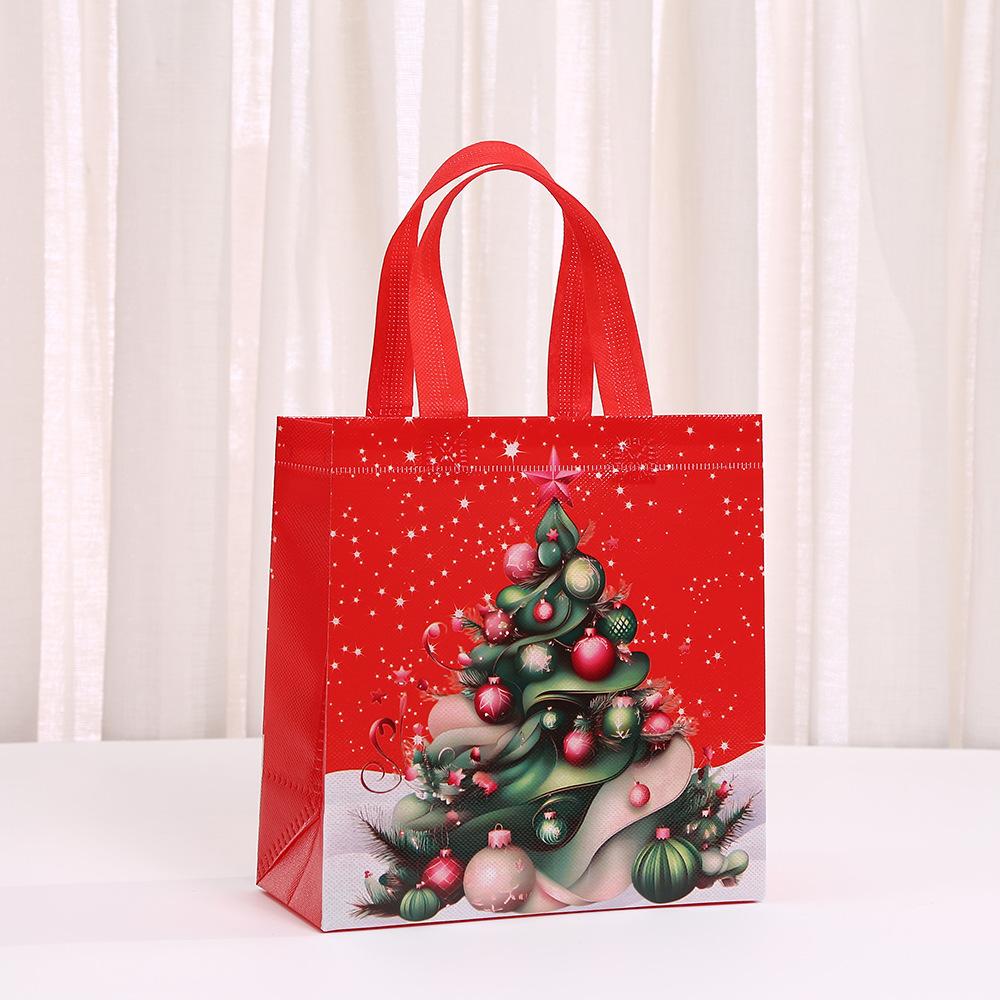 StoBag Christmas Non Woven Bags Red Santa Reindeer Gift Wrapping Bags Reusable Tote Bags for Sweets Holiday Candy Treat