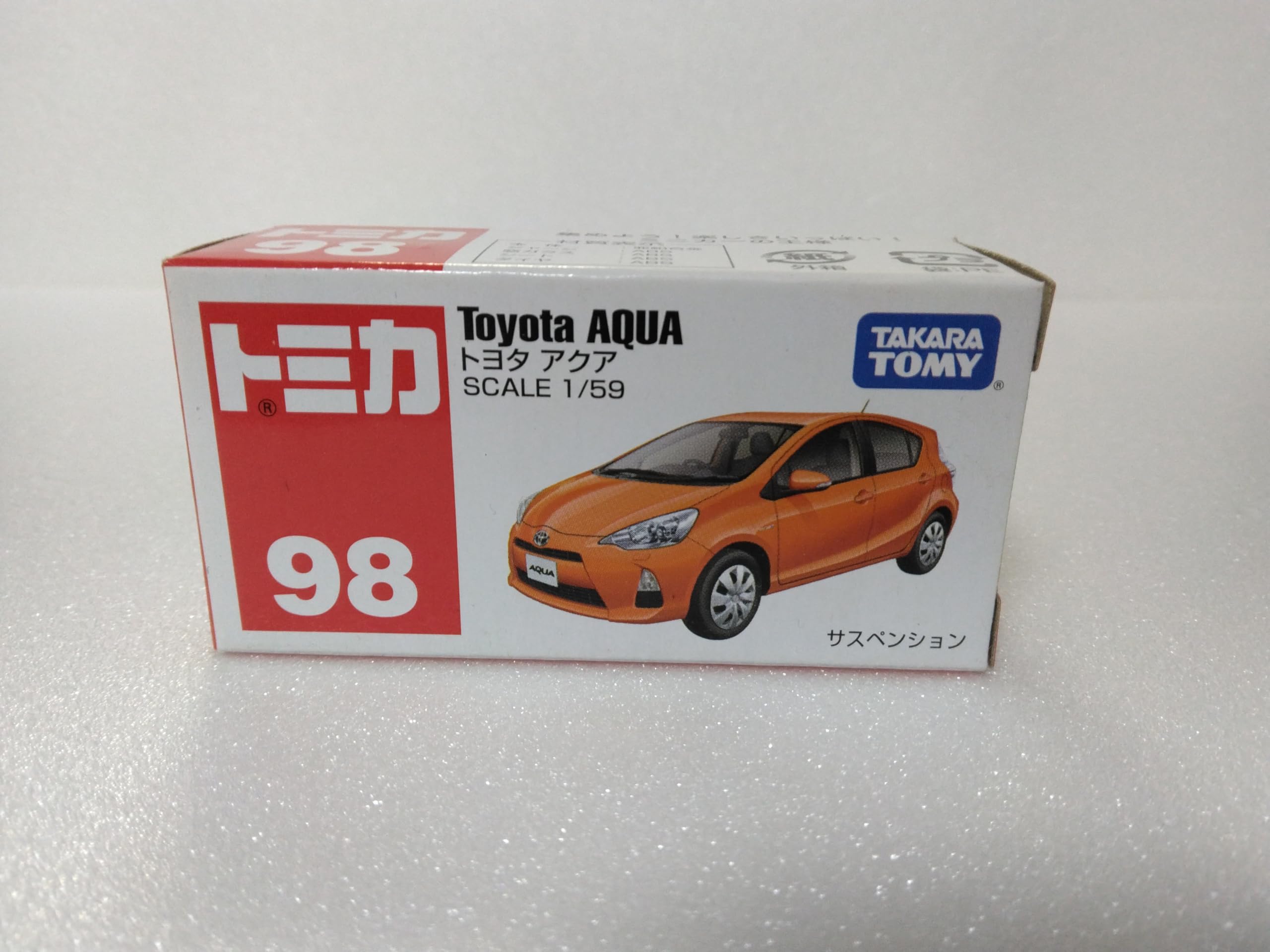 

Tomica Toyota з прозорим кейсом №98 Aqua, масштаб 1/59, помаранчевий,
