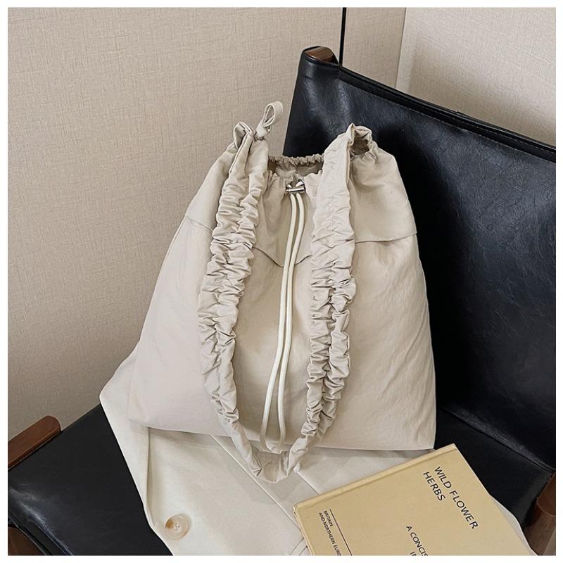 Large capacity drawstring bag niche tote bag summer new personalized leisure shoulder messenger commuter bag