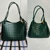 2025 New leather women's bag fashion classic woven bag butterfly buckle parachute shoulder oblique span bag