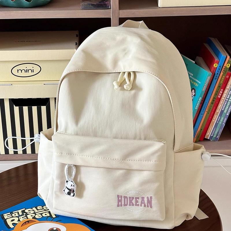 Versatile college student schoolbag women's high-value lightweight travel small backpack ins wind junior high school women's backpack