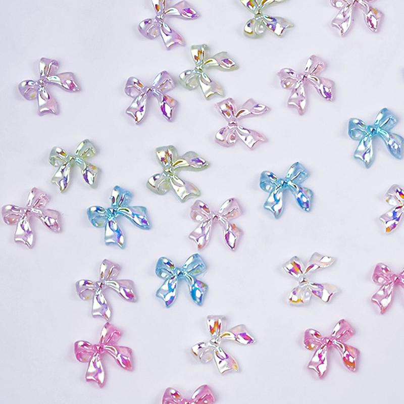 50 Stück Auroras Schleife 3D Nail Art Dekoration Harz Nagelanhänger Jelly Farbe Glitzer Nagelband Schleifen Schmetterling DIY Maniküre Salon