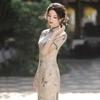 Elegant Modern Chinese Style Long Cheongsam Dress Women Semi-High Neck Three-Quarter Sleeve Retro Floral Cutwork Fabric