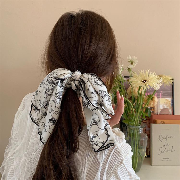 

«Элегантная французская лента для волос с чернилами»: Новый нишевый дизайн с большим бантом для элитных низких хвостиков.