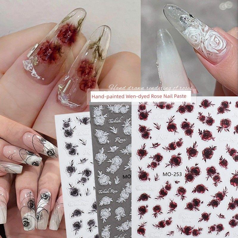 

Hand-Painted Rose Nail Sticker Relief Three-Dimensional Gothic Style Black White Semi-Transparent Red Rose Flower Nail Sticker One for each of the 3 paragraphs