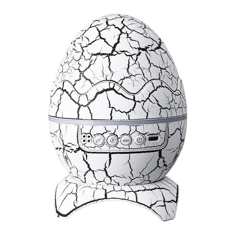 Dinosaur Egg Table Lamp and Projector: Starry Sky and Nebula Light with Remote-Controlled Speaker for Nighttime Ambiance.