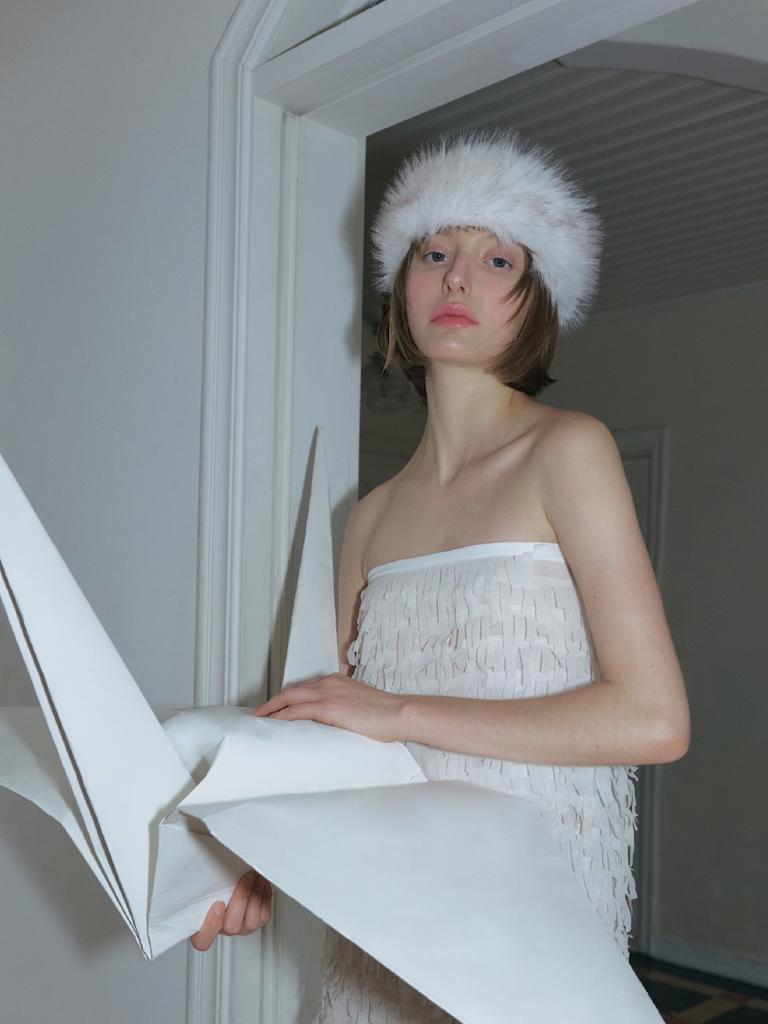 Poejidam Fur Warmer In Cream