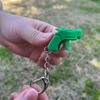 Creative Weapon Mini Gun Model Pendant Keychain  Bag Decoration Stress Relieving Toys Keychain Car Key Rings Gifts