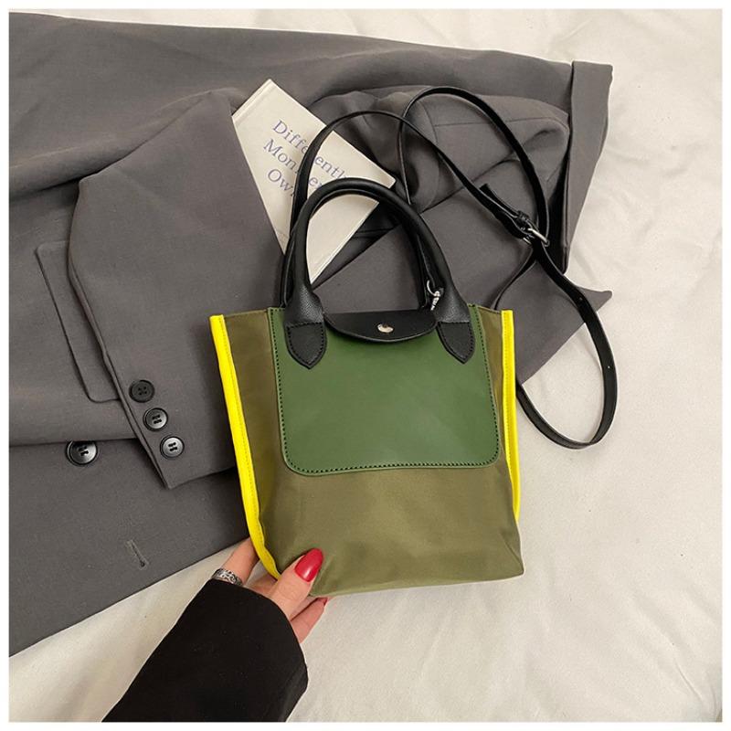 

Нишевая сумка с контрастной цветной вставкой, женская новая модная универсальная сумка-мессенджер, портативная сумка-ведро