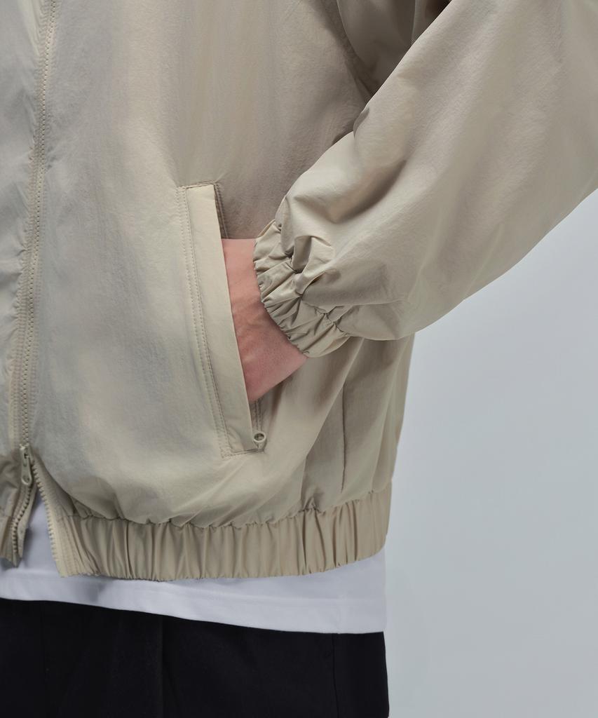 Musinsa Standard Oversized High-Neck Windbreaker Jacket [Light Beige]