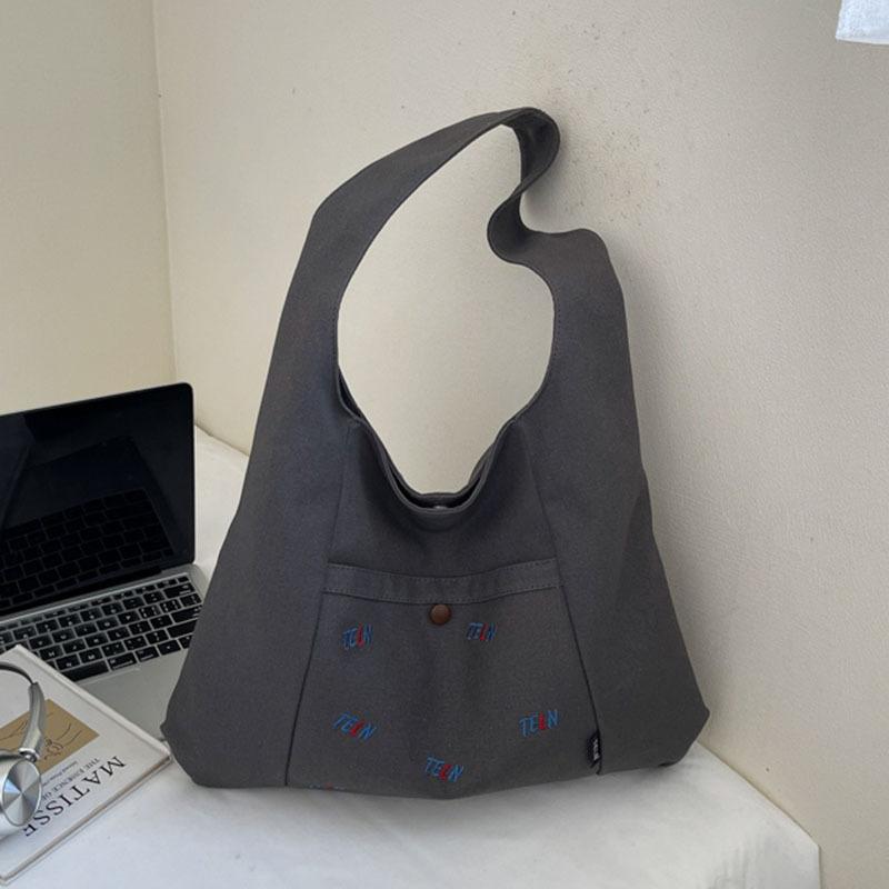 Canvas bag Women's shoulder bag Large capacity commuter tote bag Versatile student armpit bag