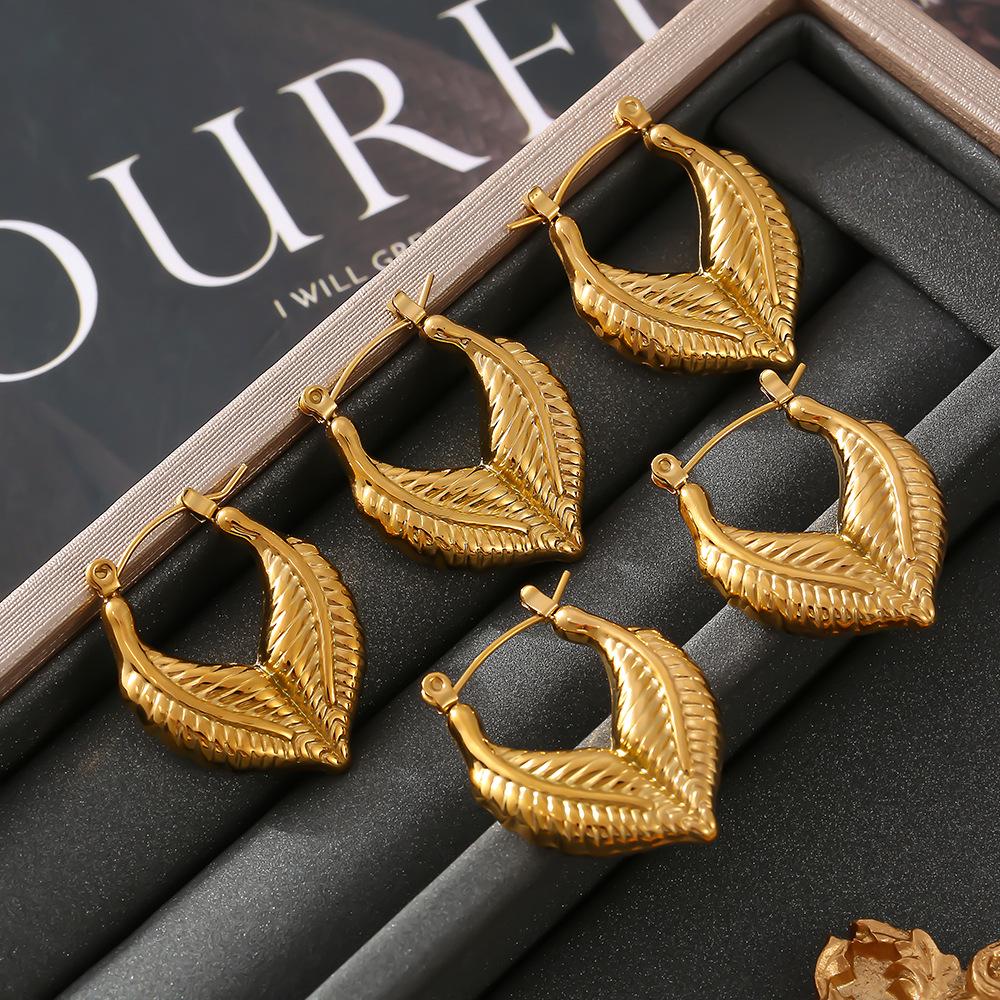 

Heart-Shaped Leaf Patchwork Earrings: INS Style, Titanium Steel, 18K Gold PVD-Plated Studs.