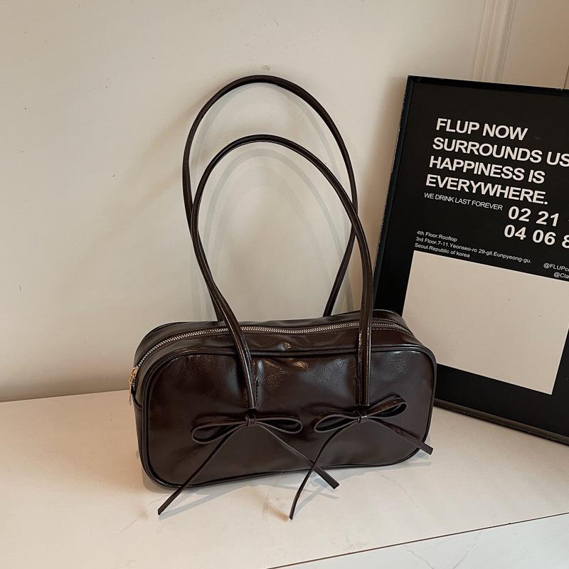 

Премиальная текстура сумка под мышкой женская зима 2025 популярная наплечная сумка большая вместимость сумка для通勤 темно-коричневого